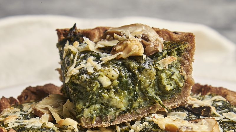 Porciones de tarta de espinaca premium de producción propia Piso Uno, relleno abundante a la vista, listas para servir